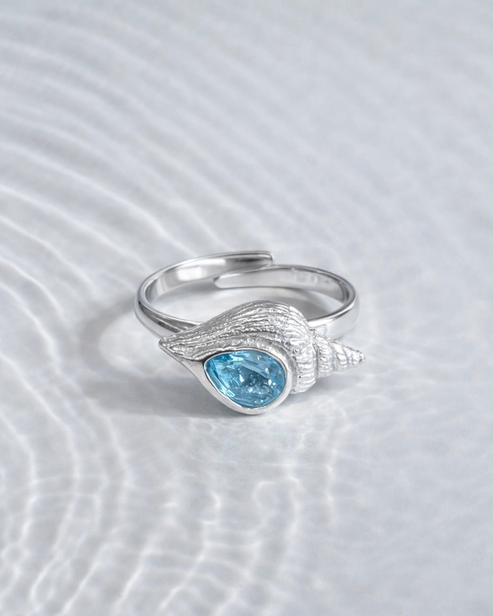 Ring spiral shell with Blue topaz Silver