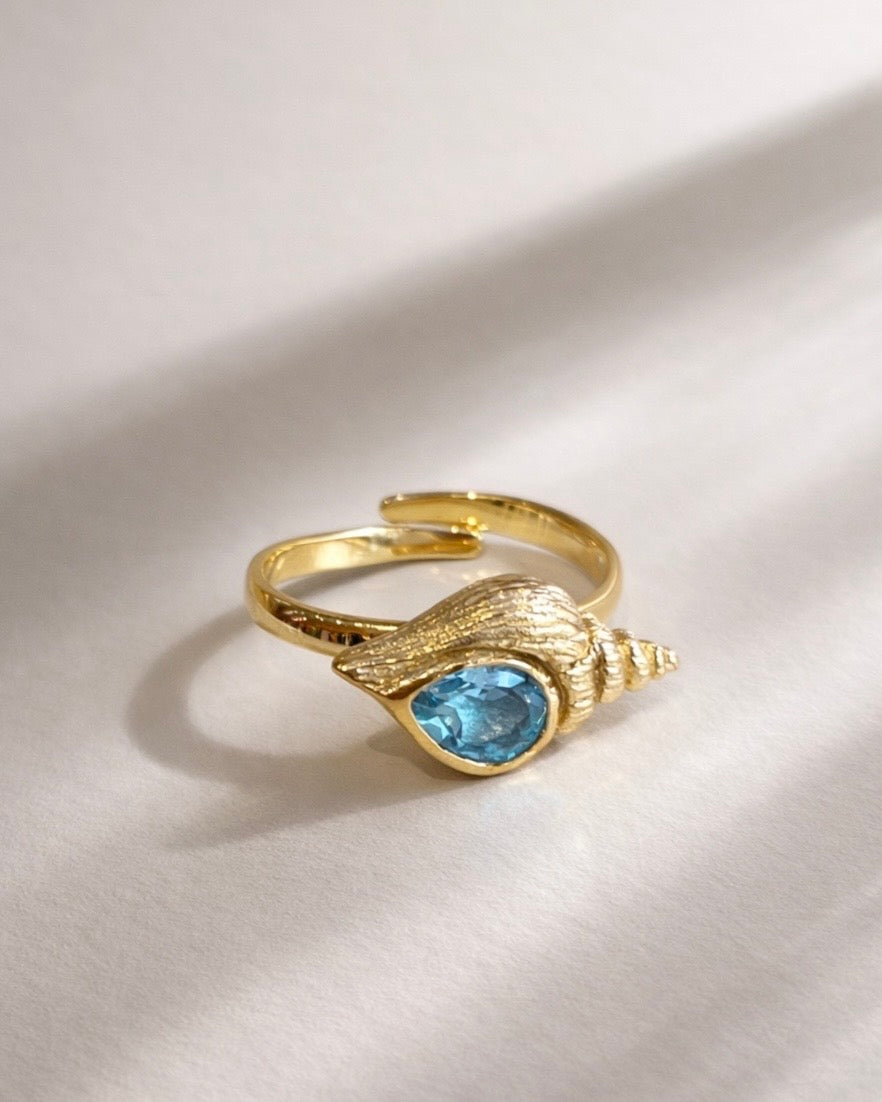 Ring spiral shell with Blue topaz Gold