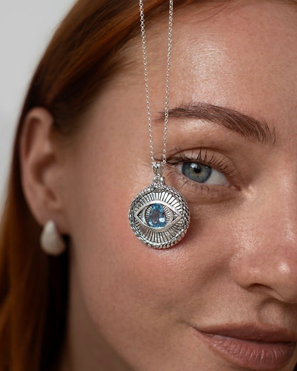 All Seeing Eye Blue Topaz Necklace, handcrafted jewelry by Celestera in Bali