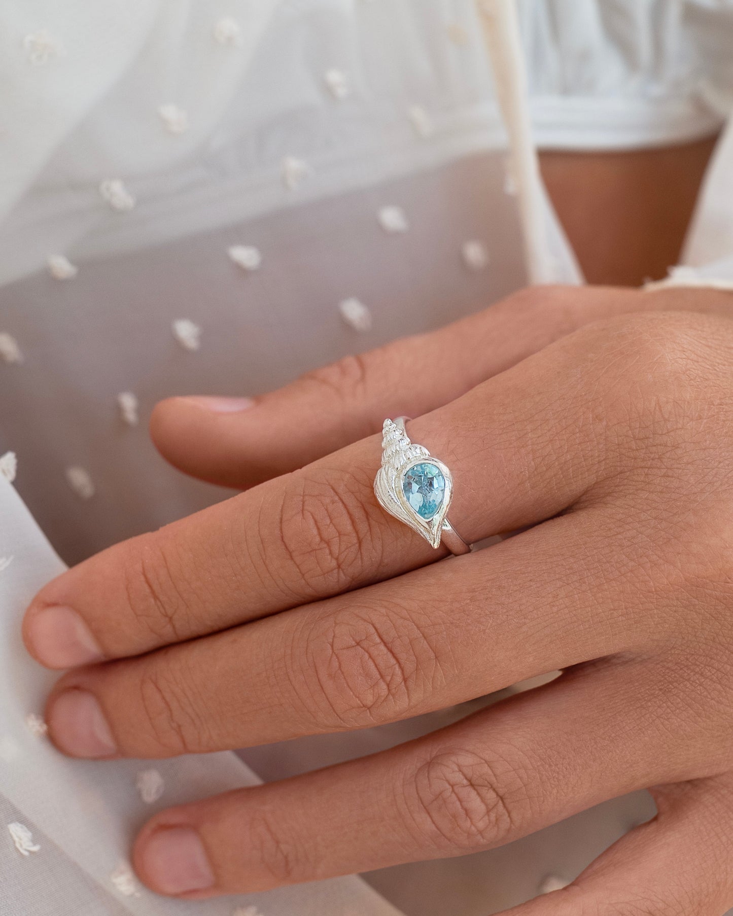 Ring spiral shell with Blue topaz Silver