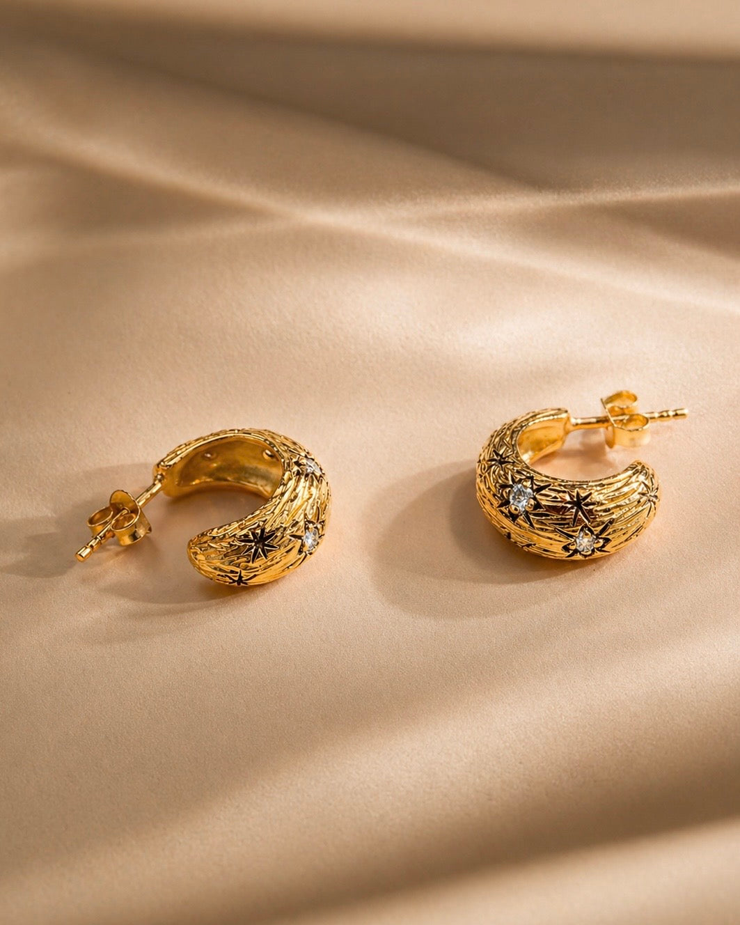Stud earrings andromeda gold plated